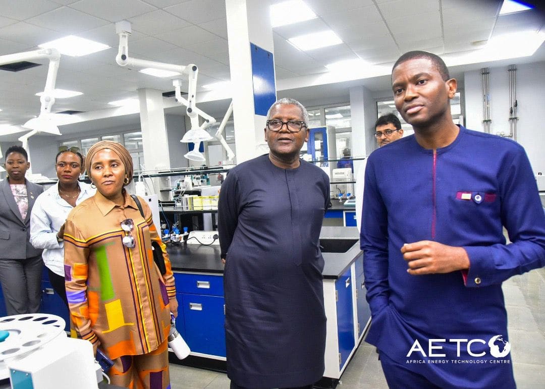 Visitors listen to a guide in a laboratory on a visit to the Dangote Petroleum Refinery, Lagos, 2024