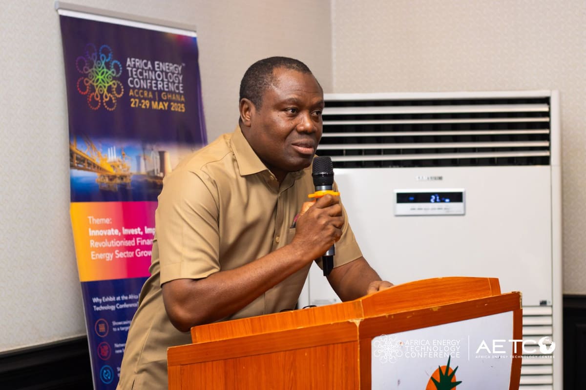 A speaker in a patterned shirt at the lectern at the Centre's breakfast meeting for AETC 2025, Labadi Beach Hotel, Accra, November 2024
