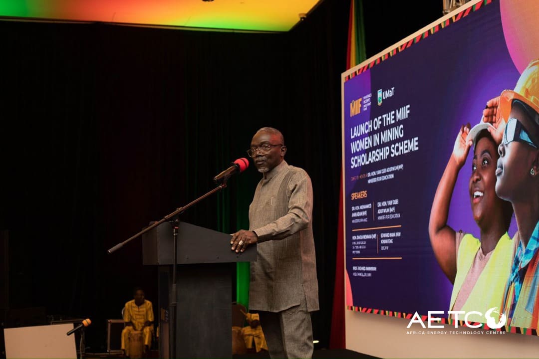 A speaker at the lectern at the launch of the Minerals Income Investment Fund's Women in Mining scholarship scheme, 2024