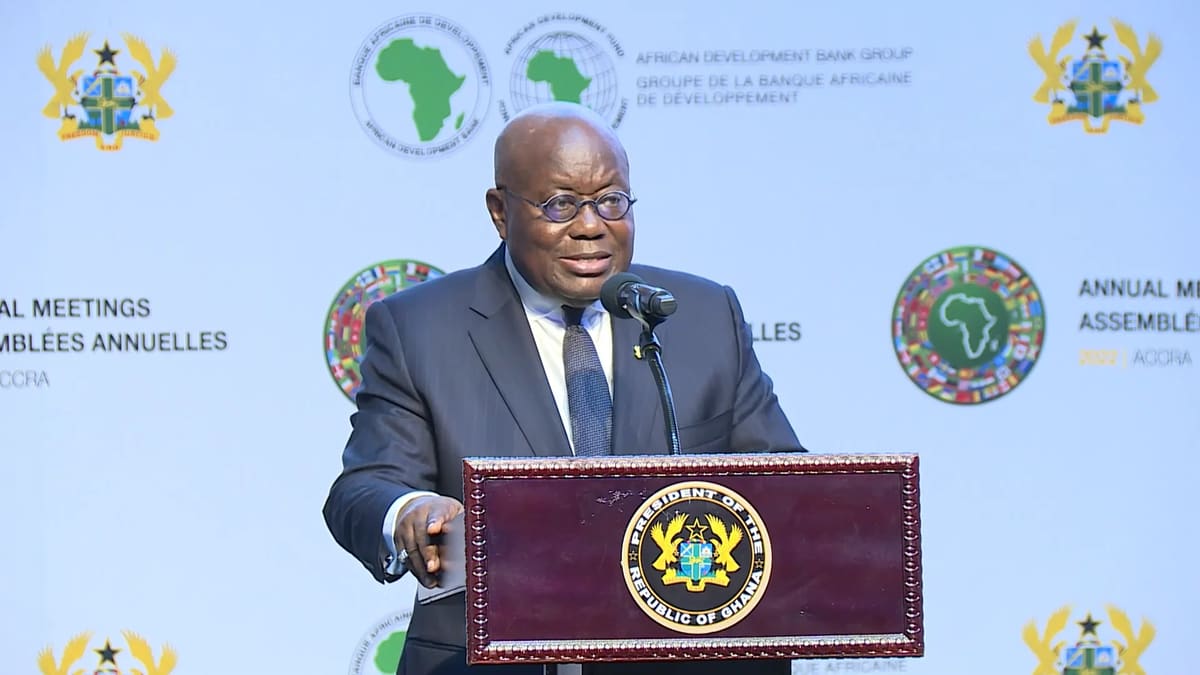 President Nana Addo Dankwa Akufo-Addo speaks at a lectern bearing the coat of arms of Ghana