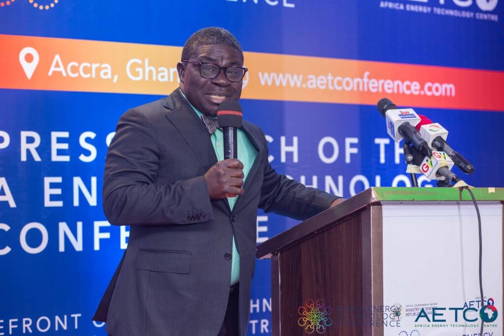 A speaker in a dark suit and glasses at the lectern at the press launch of the first Africa Energy Technology Conference, Alisa Hotel, Accra, June 2023
