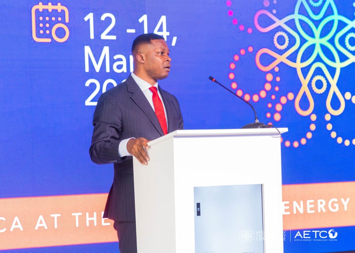 A speaker at a lectern at the 2024 Africa Energy Technology Conference