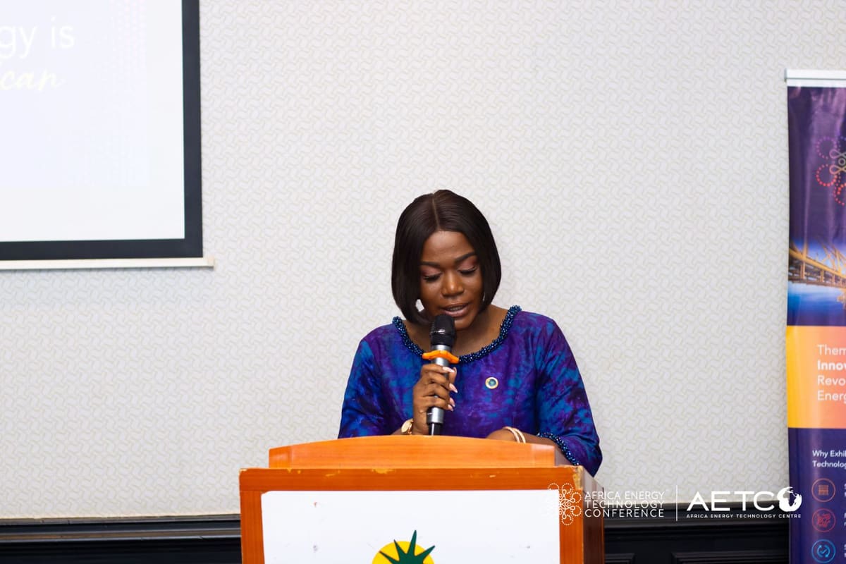 A speaker in a blue dress at the lectern at the Centre's breakfast meeting for AETC 2025, Labadi Beach Hotel, Accra, November 2024