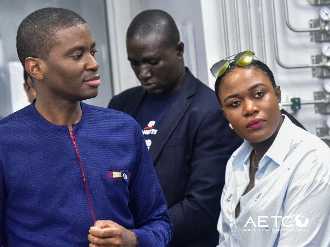 Two visitors talk in a laboratory on a visit to the Dangote Petroleum Refinery, Lagos, 2024