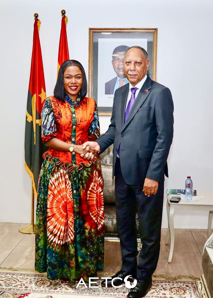 Emelia Akumah and Ambassador Rui Orlando Xavier shake hands at the Embassy of Angola